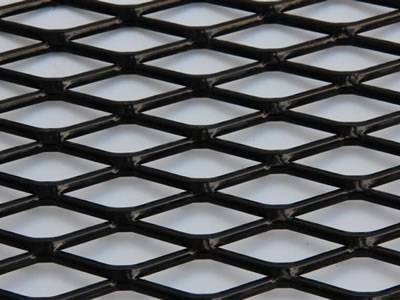 A black color decorative expanded metal mesh on the white background.
