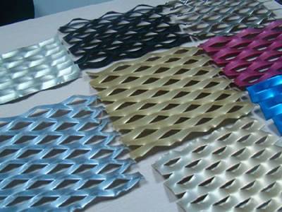 Various colors of decorative expanded metal mesh on the table.