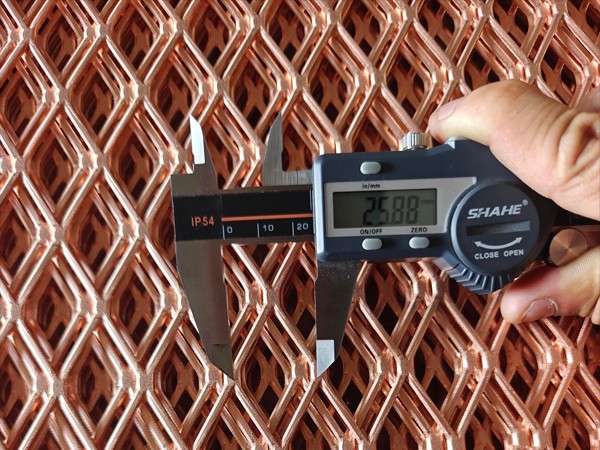 Measure the SWD of copper expanded metal mesh with a caliper.