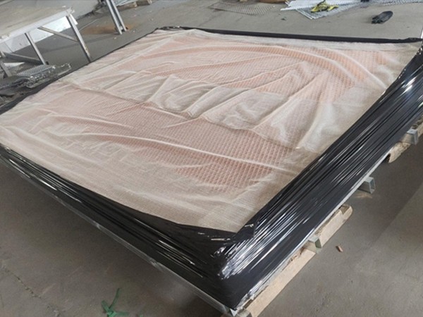Copper expanded metal mesh sealed with black protective film