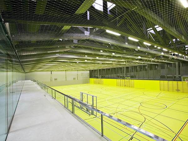 Bottom of a gymnasium adorned with expanded metal sheet.